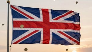 UK flag with coins and rising sun