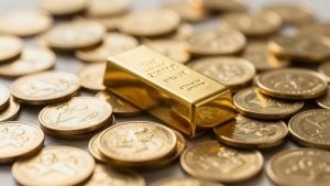 Gold bar and coins, financial success theme.