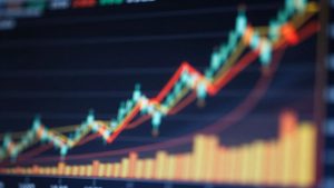 Abstract financial market trends visualized with dynamic shapes and colors.